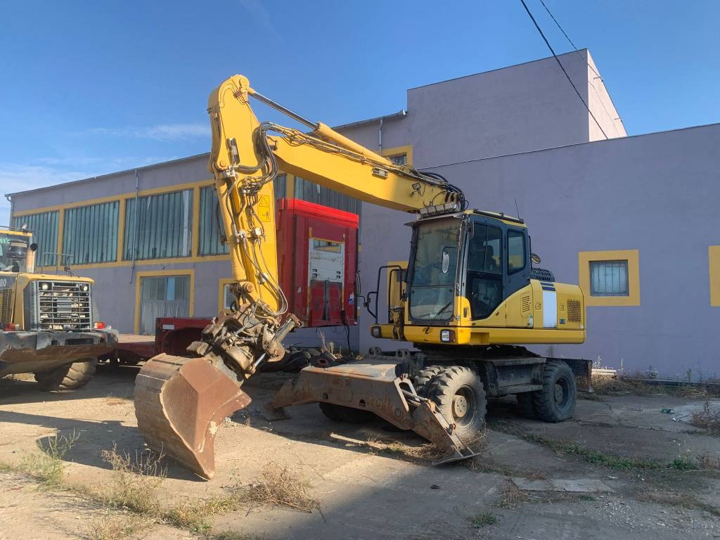 Komatsu PW180-E0+Engcon Rototilt  - Pelle sur pneus: photos 1 Komatsu PW180-E0+Engcon Rototilt  - Pelle sur pneus: photos 1