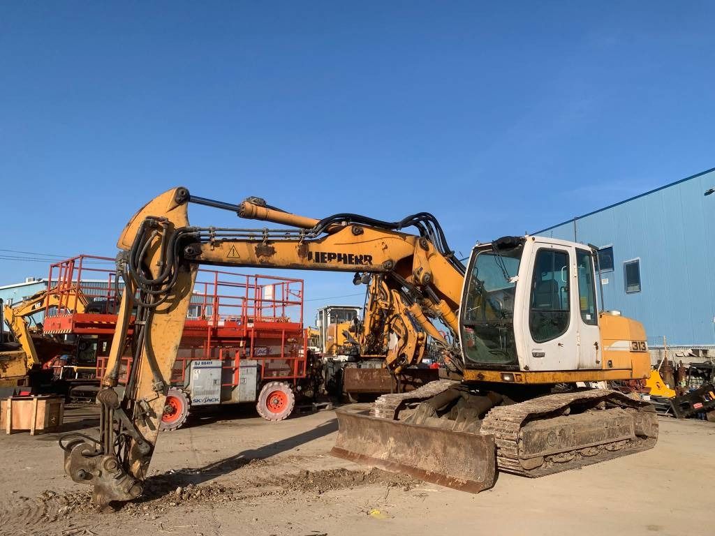 Liebherr R 313 - Pelle sur chenille: photos 1 Liebherr R 313 - Pelle sur chenille: photos 1