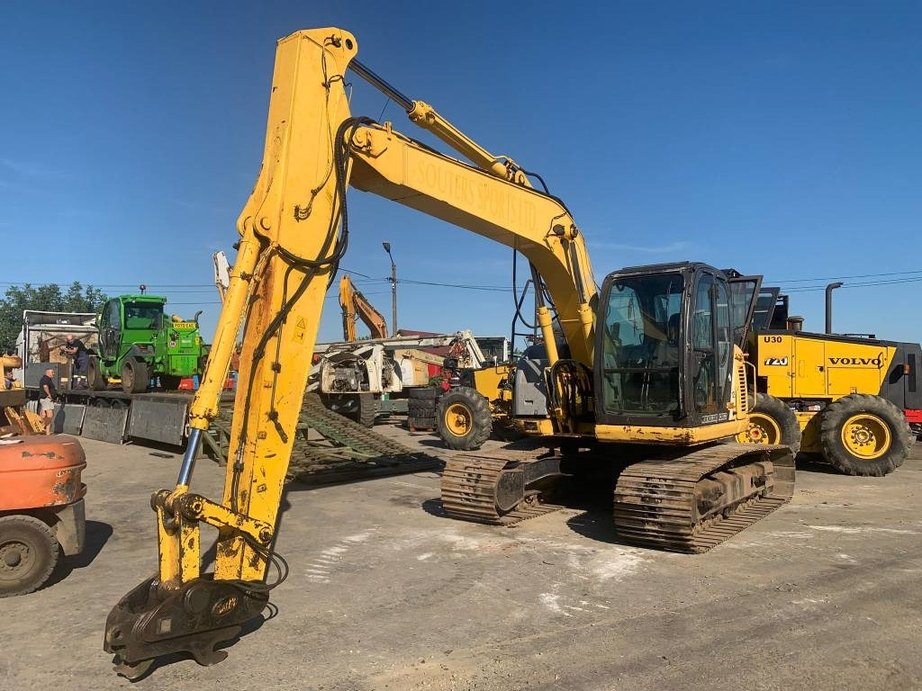 New Holland E 135 SR  - Pelle sur chenille: photos 5 New Holland E 135 SR  - Pelle sur chenille: photos 5