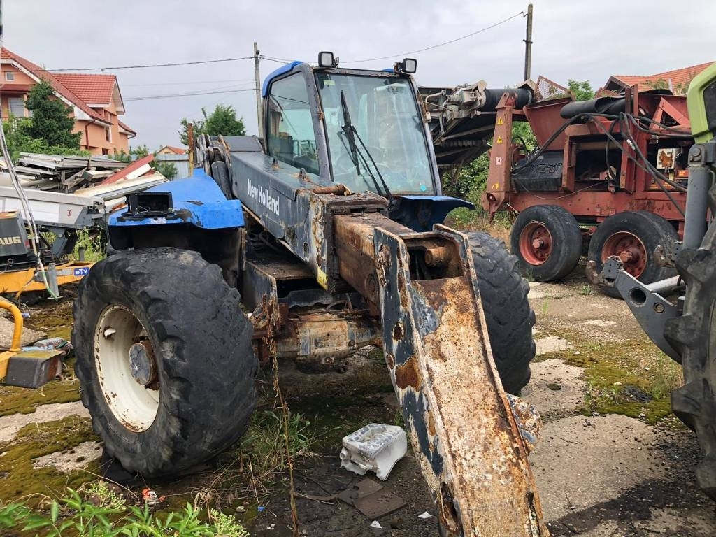 New Holland LM 435-410 FOR PARTS - Chariot télescopique: photos 1 New Holland LM 435-410 FOR PARTS - Chariot télescopique: photos 1
