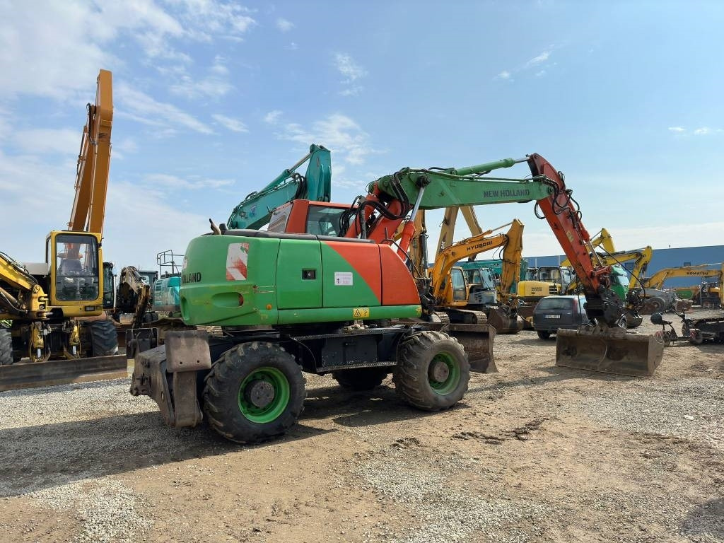 New Holland MH Plus  - Pelle sur pneus: photos 4 New Holland MH Plus  - Pelle sur pneus: photos 4