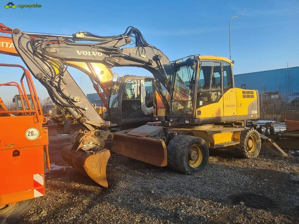 Volvo EW 140 C - Pelle sur pneus: photos 1 Volvo EW 140 C - Pelle sur pneus: photos 1