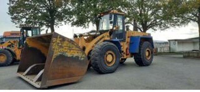 Hanomag 70E Radlader - Chargeuse sur pneus: photos 1 Hanomag 70E Radlader - Chargeuse sur pneus: photos 1