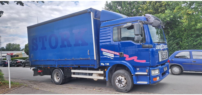 MAN 12.250 TGM - Camion à rideaux coulissants: photos 3 MAN 12.250 TGM - Camion à rideaux coulissants: photos 3