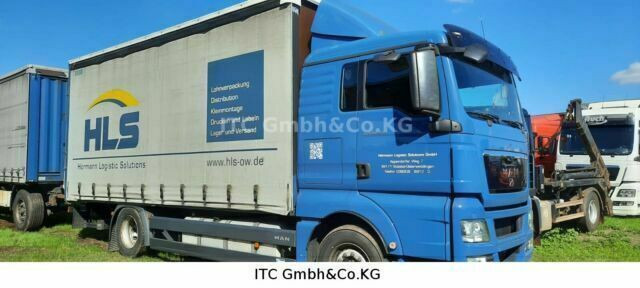 MAN TGX18.400 Pritsche Plane - Camion à rideaux coulissants: photos 1 MAN TGX18.400 Pritsche Plane - Camion à rideaux coulissants: photos 1