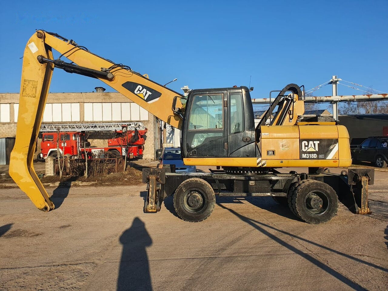 Caterpillar 318 D MH - Pelle de manutention: photos 1 Caterpillar 318 D MH - Pelle de manutention: photos 1