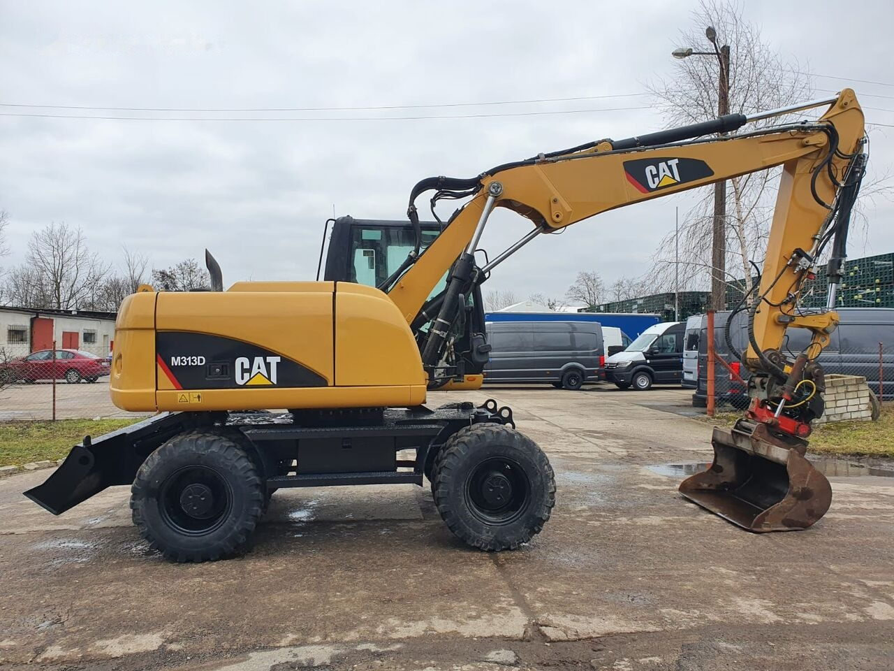 Pelle sur pneus Caterpillar M 313 D Tiltrotator: photos 7