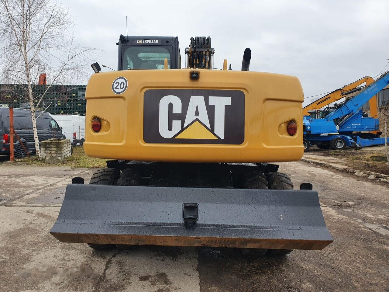 Pelle sur pneus Caterpillar M 313 D Tiltrotator: photos 10