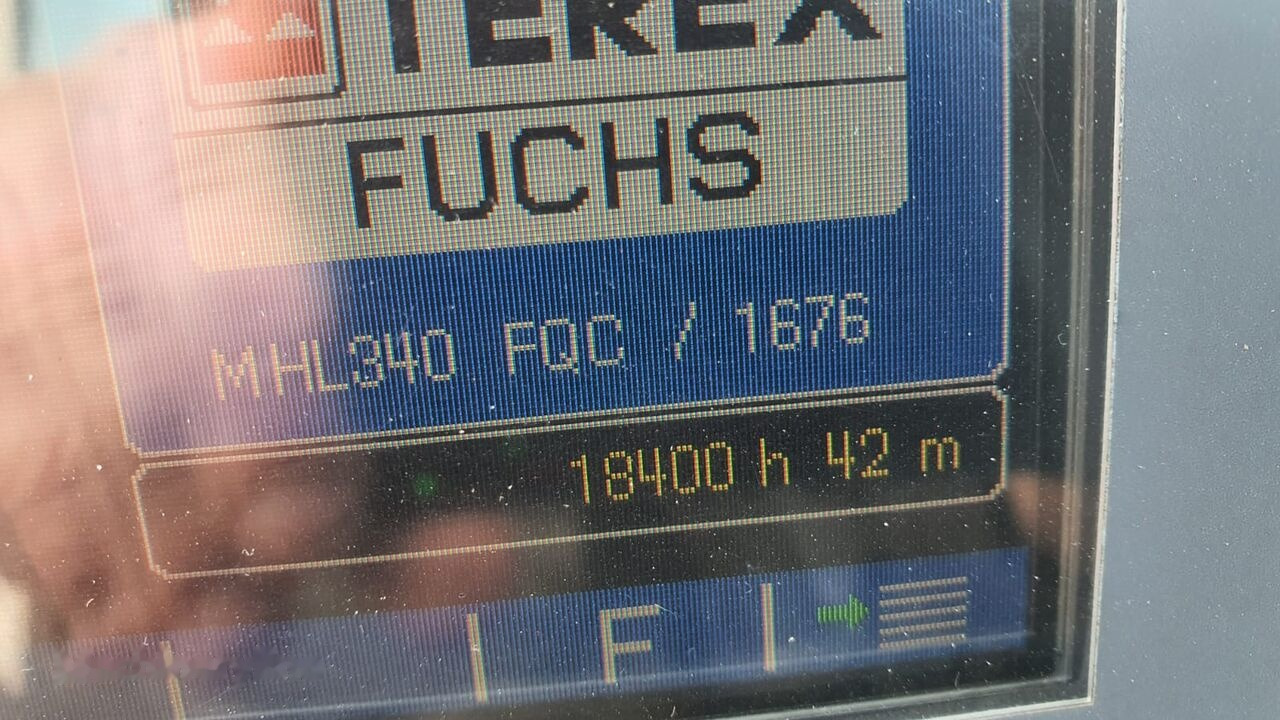 Pelle de manutention Fuchs MHL 340D FQC + LST 3to shear: photos 15