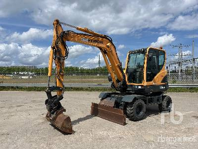 HYUNDAI ROBEX 55W-9 - Pelle sur pneus: photos 1 HYUNDAI ROBEX 55W-9 - Pelle sur pneus: photos 1