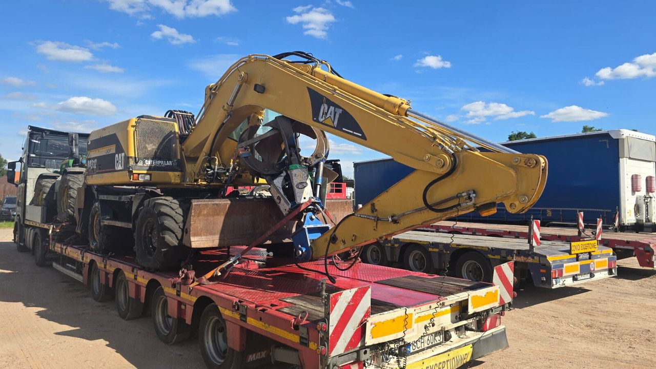 Caterpillar M312 Koparka PrzeŁAdunkowa Czerpak Świeżo Sprowadz ona - Pelle sur pneus: photos 1 Caterpillar M312 Koparka PrzeŁAdunkowa Czerpak Świeżo Sprowadz ona - Pelle sur pneus: photos 1
