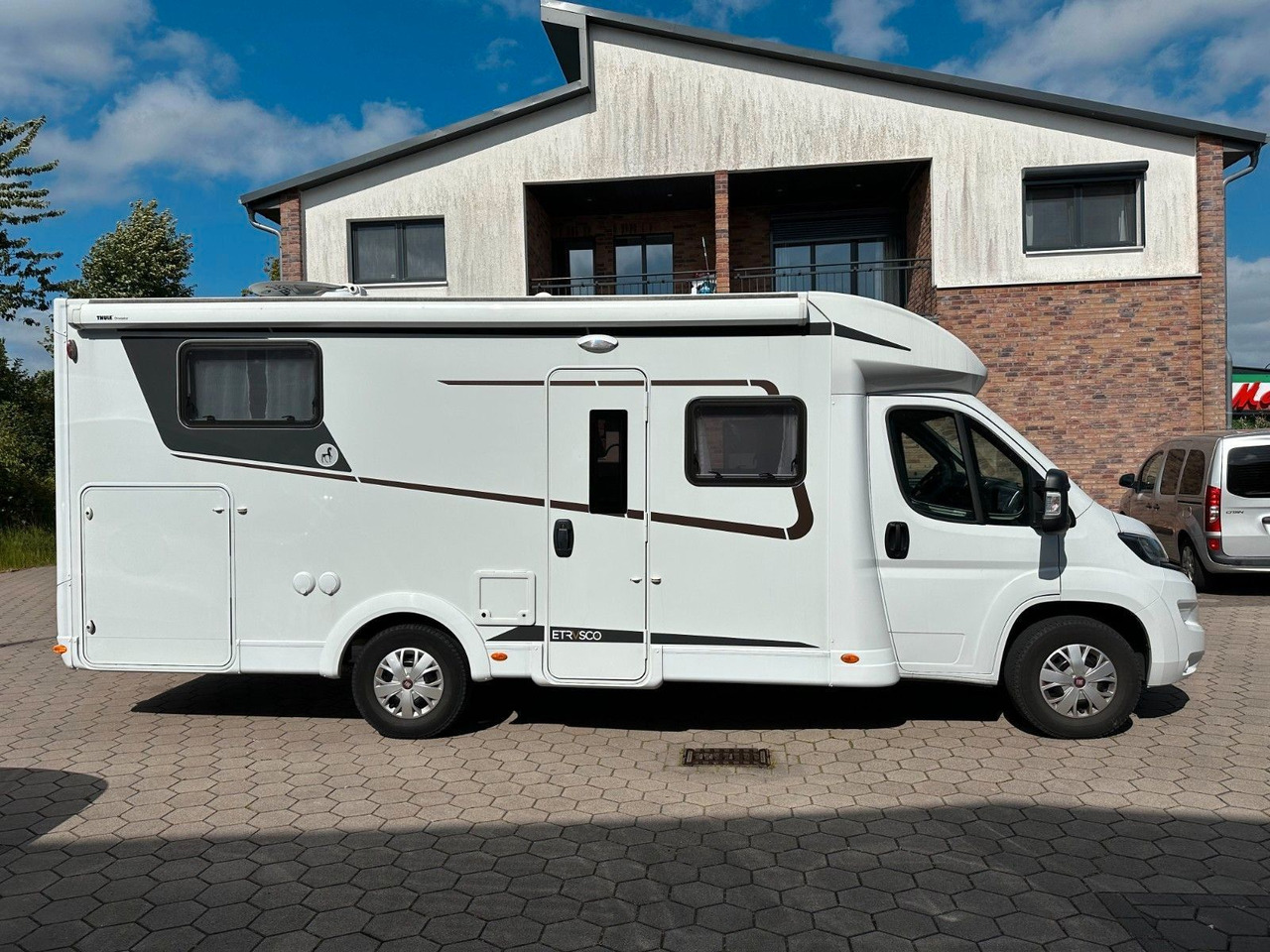 Etrusco T 7300 SB/Einzelbetten+Hubbett/Garage/Klima/TOP - Camping-car profilé: photos 1 Etrusco T 7300 SB/Einzelbetten+Hubbett/Garage/Klima/TOP - Camping-car profilé: photos 1