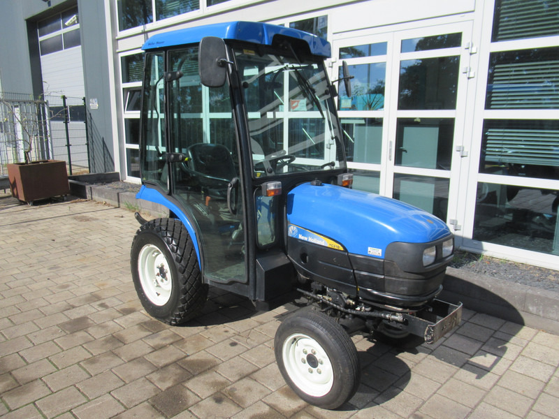 New Holland TC21D 4WD 4x4 Cabine Verwarming - Tracteur agricole: photos 5 New Holland TC21D 4WD 4x4 Cabine Verwarming - Tracteur agricole: photos 5