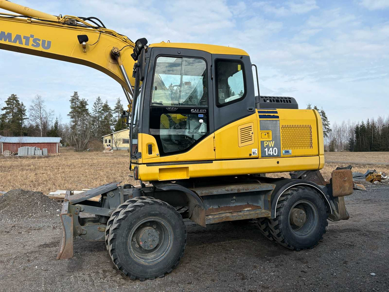 Wheel excavator Komatsu PW140-7 - Pelle sur pneus: photos 3 Wheel excavator Komatsu PW140-7 - Pelle sur pneus: photos 3