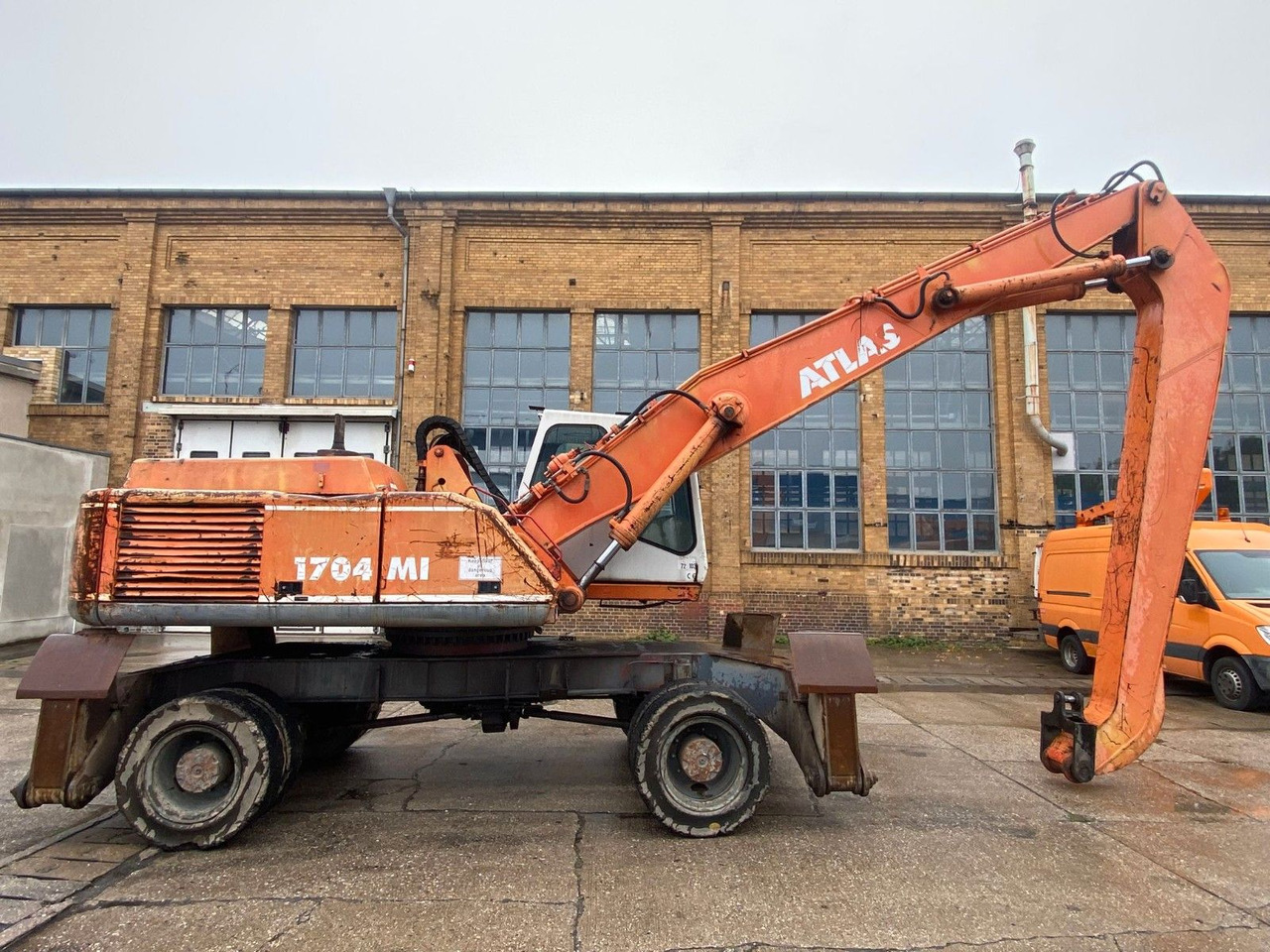 Atlas 1704 MI mit Greifer Umschlagbagger Lang - Pelle sur pneus: photos 2 Atlas 1704 MI mit Greifer Umschlagbagger Lang - Pelle sur pneus: photos 2