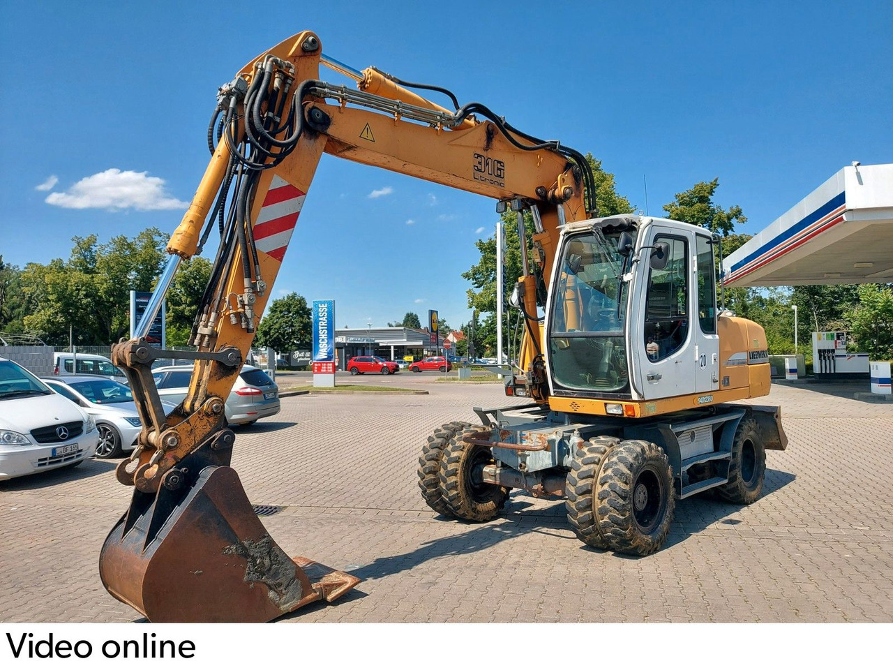 Liebherr A 316 LITRONIC TL + 2005 DEUTZ 13400 STD. Liebherr A 316 LITRONIC TL + 2005 DEUTZ 13400 STD. - Pelle sur pneus: photos 2 Liebherr A 316 LITRONIC TL + 2005 DEUTZ 13400 STD. Liebherr A 316 LITRONIC TL + 2005 DEUTZ 13400 STD. - Pelle sur pneus: photos 2