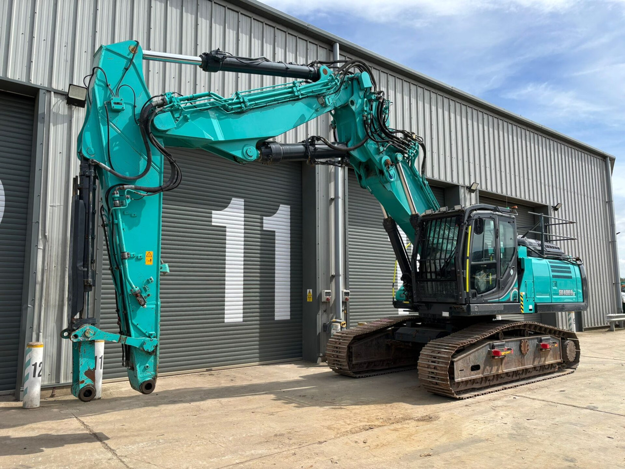 Kobelco SK400DLC-10 25m 3 Piece Demolition Arm - Pelle sur chenille: photos 1 Kobelco SK400DLC-10 25m 3 Piece Demolition Arm - Pelle sur chenille: photos 1