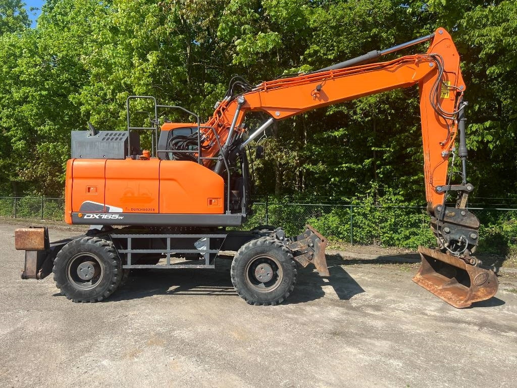 Doosan DX 165 W-5 - Pelle sur pneus: photos 5 Doosan DX 165 W-5 - Pelle sur pneus: photos 5