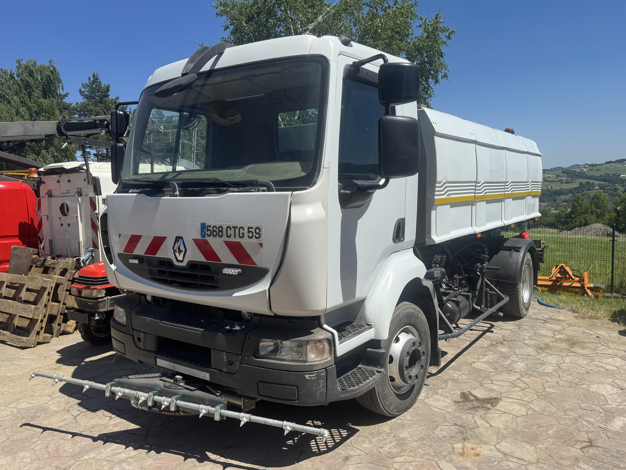 Renault Midlum water truck laveuse sprinkler - Balayeuse de voirie: photos 1 Renault Midlum water truck laveuse sprinkler - Balayeuse de voirie: photos 1