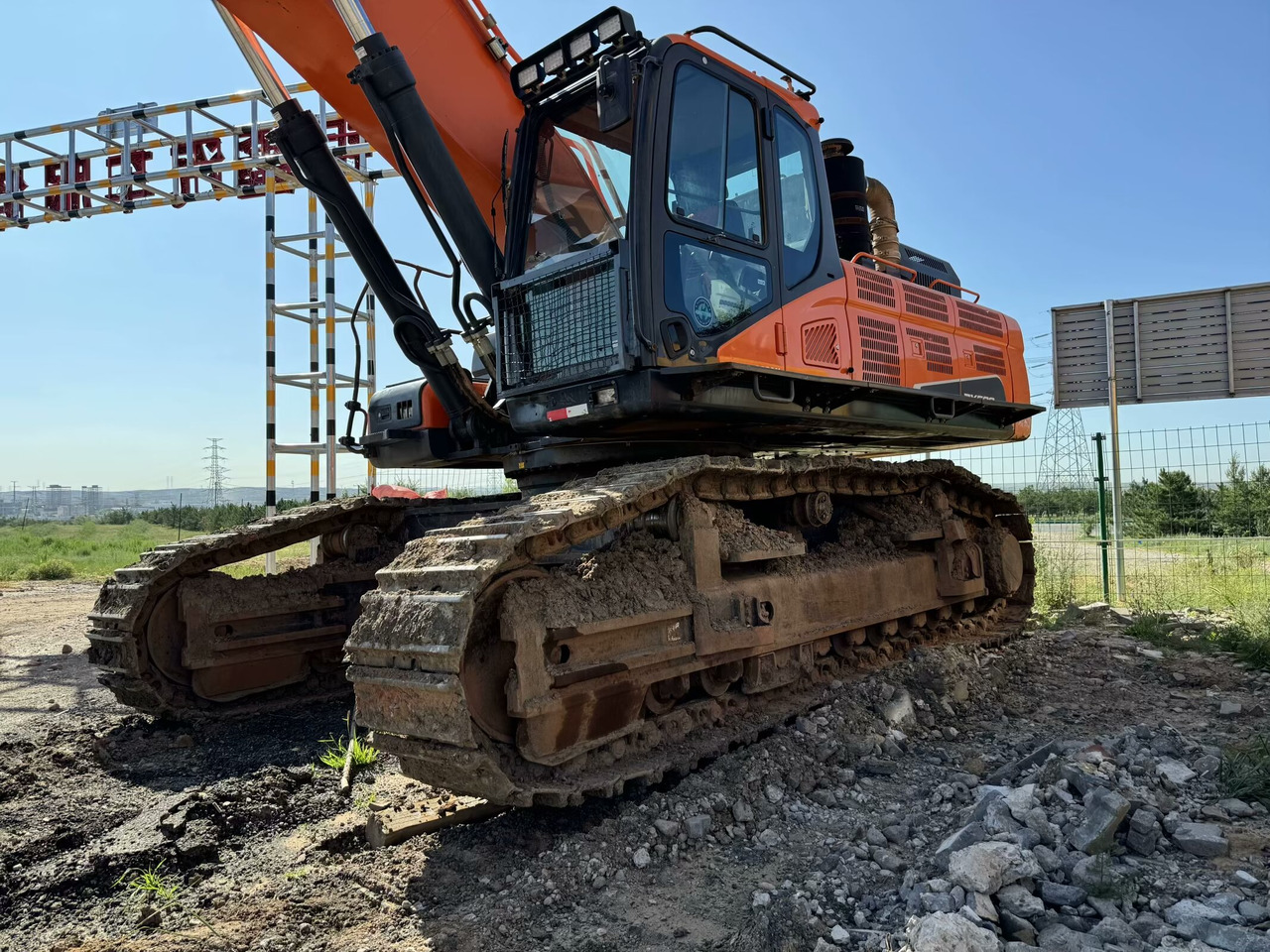 DOOSAN DX520LC-9C - Pelle sur chenille: photos 1 DOOSAN DX520LC-9C - Pelle sur chenille: photos 1