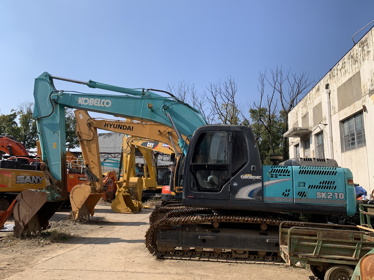 KOBELCO SK210LC-8 - Pelle sur chenille: photos 1 KOBELCO SK210LC-8 - Pelle sur chenille: photos 1