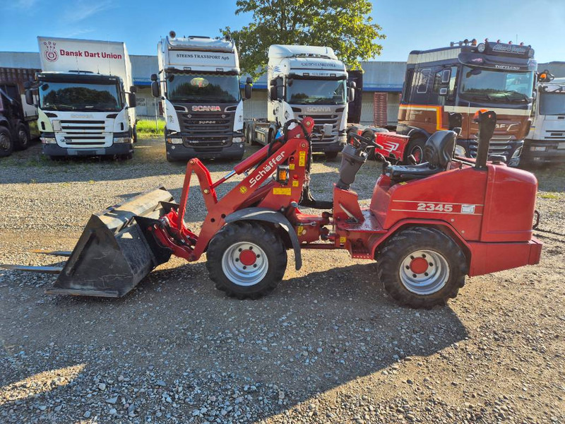 Schäffer 2345 (Bucket/Forks) - Chargeuse compacte sur chenilles: photos 1 Schäffer 2345 (Bucket/Forks) - Chargeuse compacte sur chenilles: photos 1