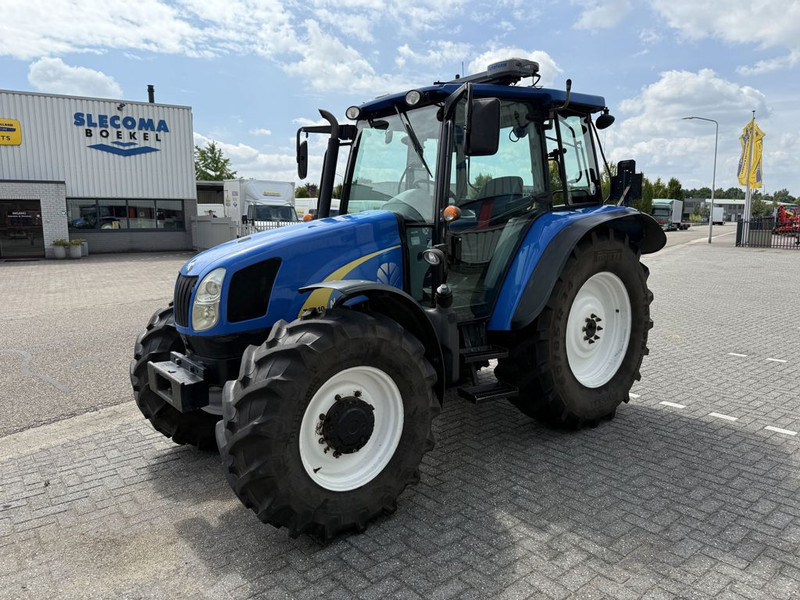 New Holland T5040 CAB + GPS - Tracteur agricole: photos 1 New Holland T5040 CAB + GPS - Tracteur agricole: photos 1