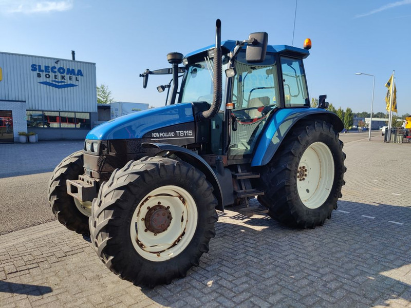 New Holland TS115 - Tracteur agricole: photos 1 New Holland TS115 - Tracteur agricole: photos 1