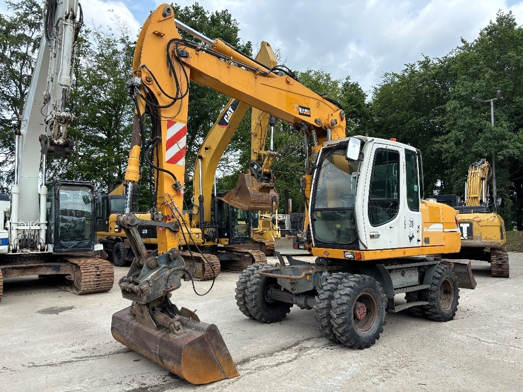Liebherr A316 - Pelle sur pneus: photos 2 Liebherr A316 - Pelle sur pneus: photos 2