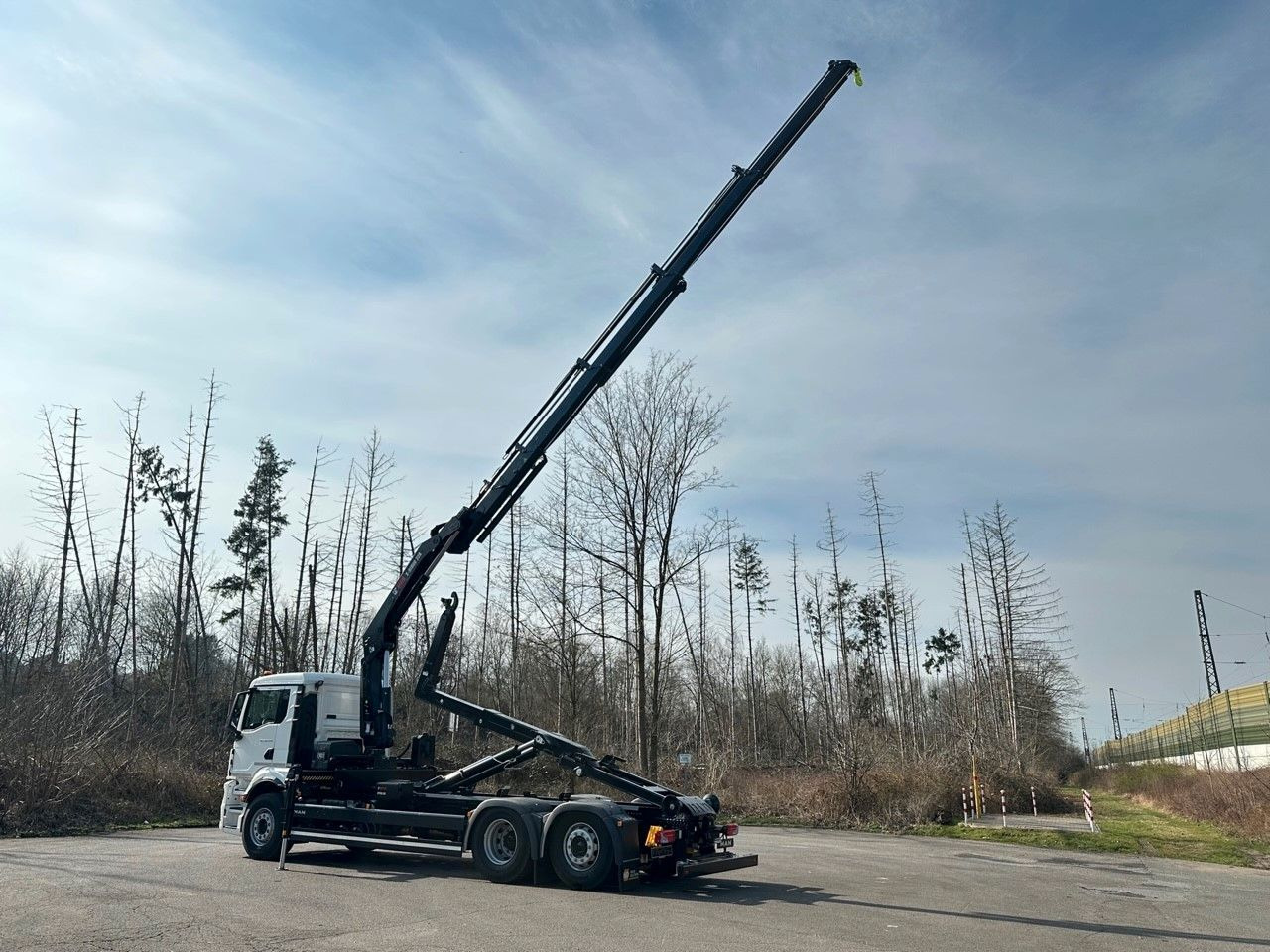 MAN TGS 26.470 6x2 Abrollkipper + Kran Hiab 228-4 - Camion ampliroll, Camion grue: photos 3 MAN TGS 26.470 6x2 Abrollkipper + Kran Hiab 228-4 - Camion ampliroll, Camion grue: photos 3