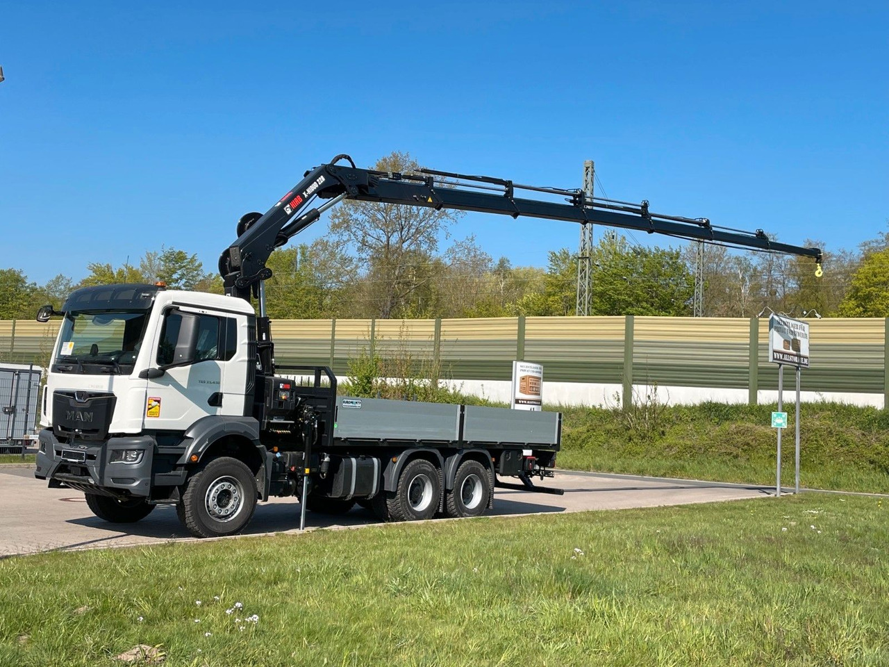 MAN TGS 33.440 6x4 HIAB 228-6 - Camion plateau, Camion grue: photos 1 MAN TGS 33.440 6x4 HIAB 228-6 - Camion plateau, Camion grue: photos 1