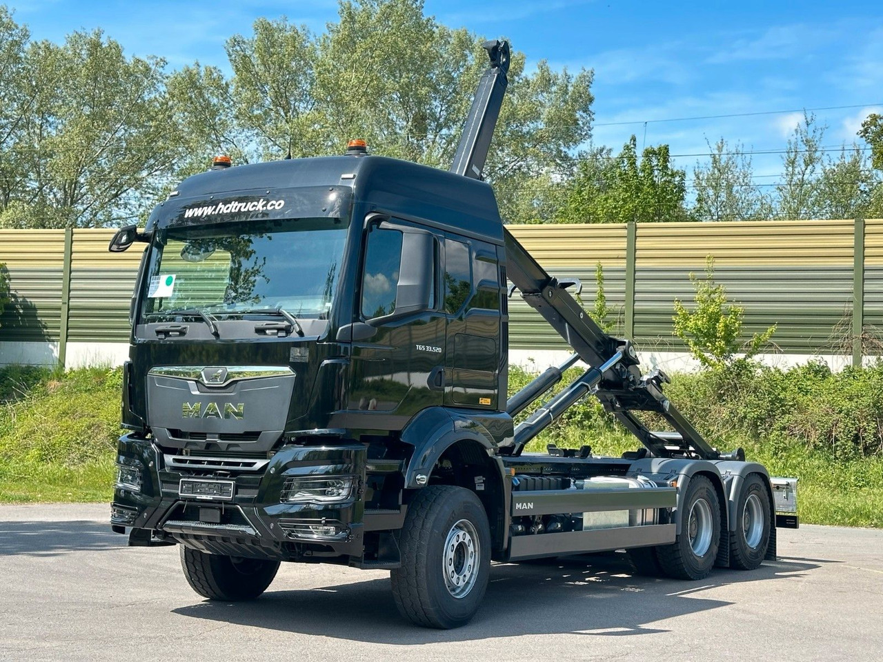MAN TGS 33.520 6X4 Euro6e Abrollkipper MULTILIFT - Camion ampliroll, Camion grue: photos 2 MAN TGS 33.520 6X4 Euro6e Abrollkipper MULTILIFT - Camion ampliroll, Camion grue: photos 2