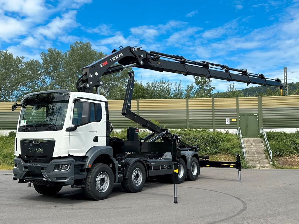 MAN TGS 35.520 8x4 Abrollkipper + Kran HIAB 658E6 - Camion ampliroll, Camion grue: photos 1 MAN TGS 35.520 8x4 Abrollkipper + Kran HIAB 658E6 - Camion ampliroll, Camion grue: photos 1