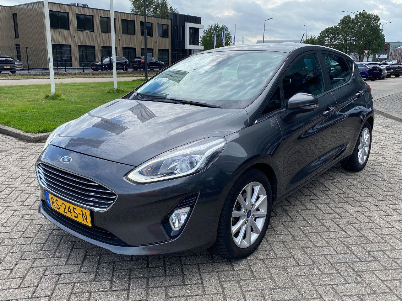 Ford Fiesta 1.0 EcoBoost Titanium | 2018 | 75.103 km | RS245N | NAP: Logisch - Voiture à hayon: photos 1 Ford Fiesta 1.0 EcoBoost Titanium | 2018 | 75.103 km | RS245N | NAP: Logisch - Voiture à hayon: photos 1