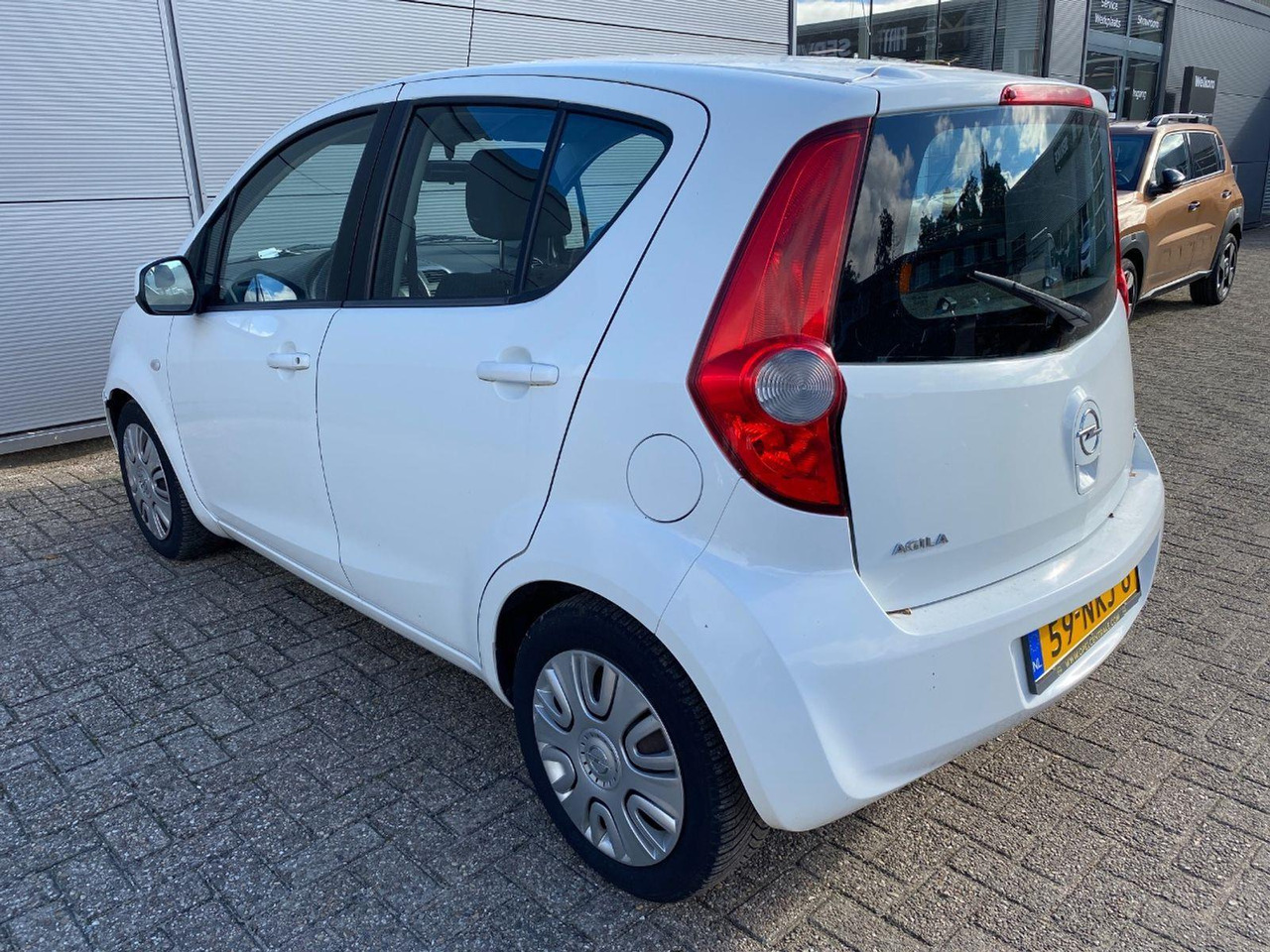Opel Agila 1.0 Edition LPG | 2010 | 149.704 km | 59NKJ6 | NAP: Logisch - Voiture à hayon: photos 3 Opel Agila 1.0 Edition LPG | 2010 | 149.704 km | 59NKJ6 | NAP: Logisch - Voiture à hayon: photos 3