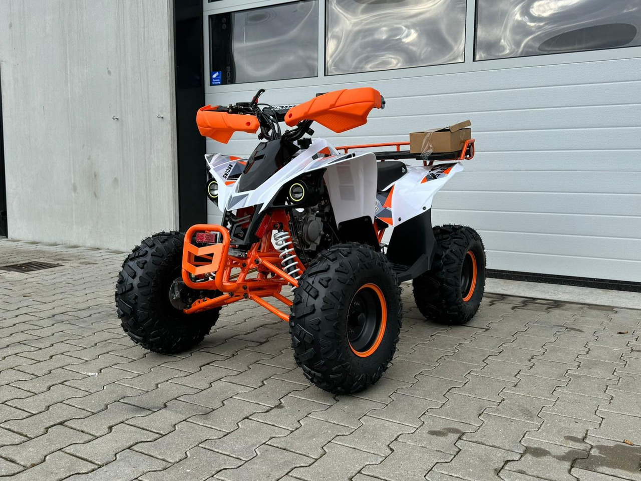 Quad UltraMotocross 125cc (oranje) - Quadricycle: photos 1 Quad UltraMotocross 125cc (oranje) - Quadricycle: photos 1