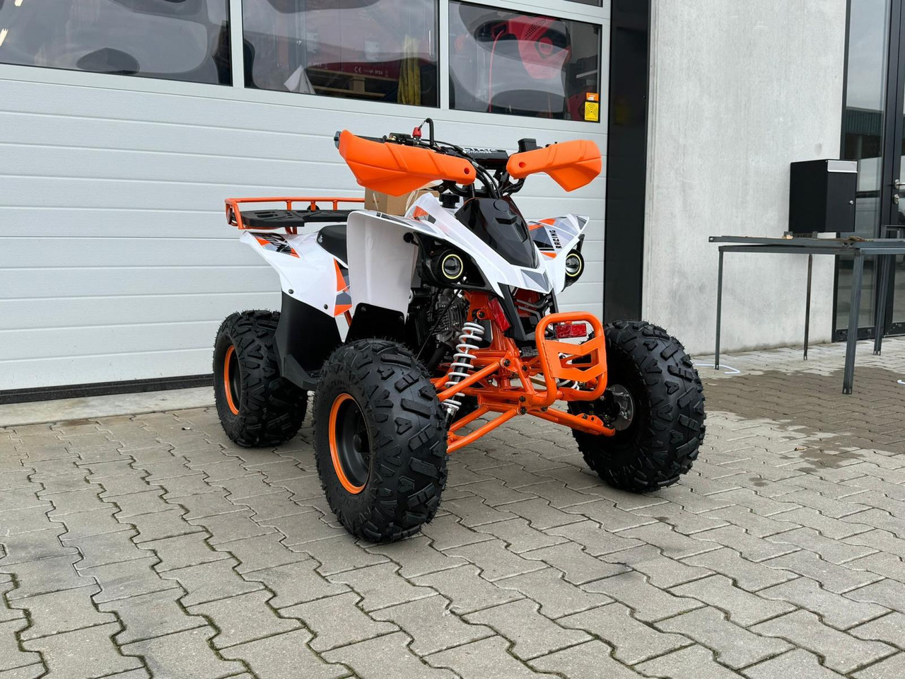 Quad UltraMotocross 125cc (oranje) - Quadricycle: photos 2 Quad UltraMotocross 125cc (oranje) - Quadricycle: photos 2