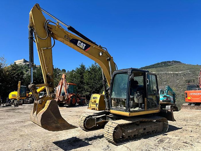 Caterpillar 311C - Pelle: photos 1 Caterpillar 311C - Pelle: photos 1