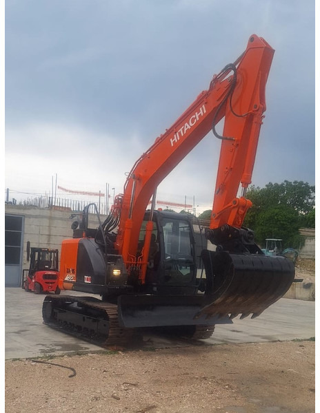 Hitachi ZX135US-6 - Pelle: photos 1 Hitachi ZX135US-6 - Pelle: photos 1
