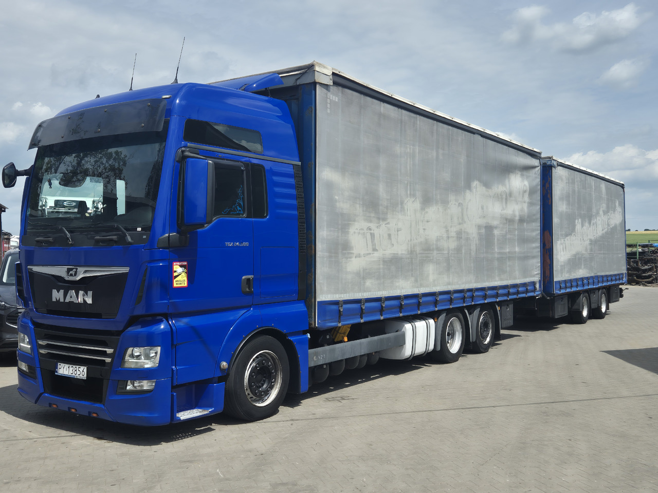 MAN tgx 24,500 - Camion à rideaux coulissants: photos 2 MAN tgx 24,500 - Camion à rideaux coulissants: photos 2
