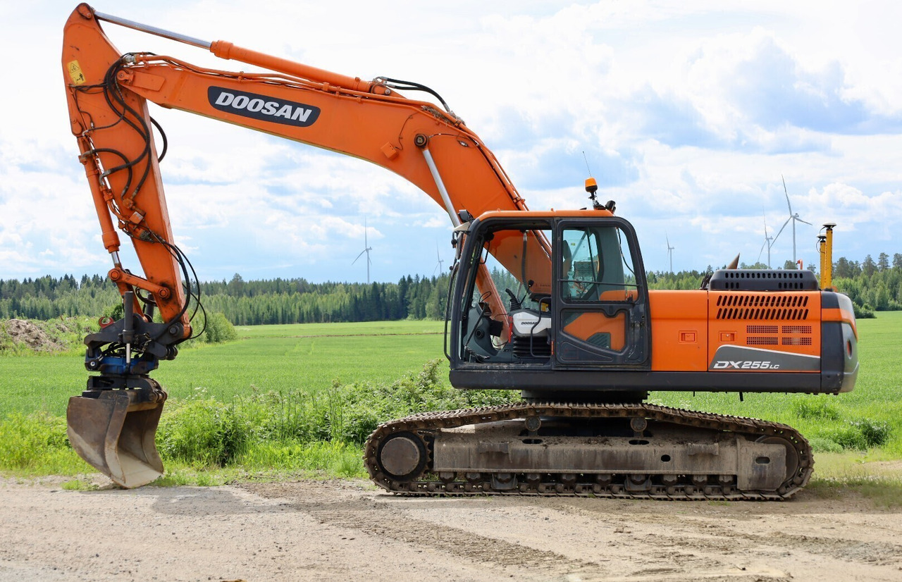 Doosan DX255 LC - 3 - Pelle sur chenille: photos 1 Doosan DX255 LC - 3 - Pelle sur chenille: photos 1