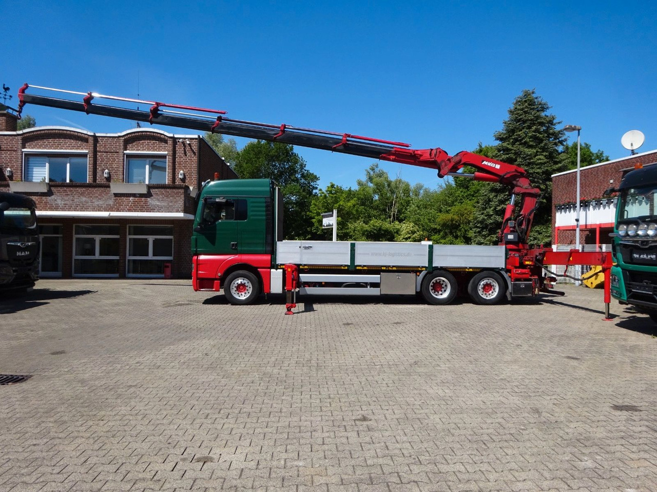 MAN 26.480 TGX + MKG HLK531 Kran +Lift-Lenkachse - Camion grue: photos 2 MAN 26.480 TGX + MKG HLK531 Kran +Lift-Lenkachse - Camion grue: photos 2