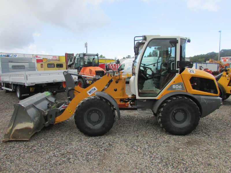 Liebherr L 506 Compact Radlader L506 41.500 EUR - Chargeuse sur pneus: photos 1 Liebherr L 506 Compact Radlader L506 41.500 EUR - Chargeuse sur pneus: photos 1