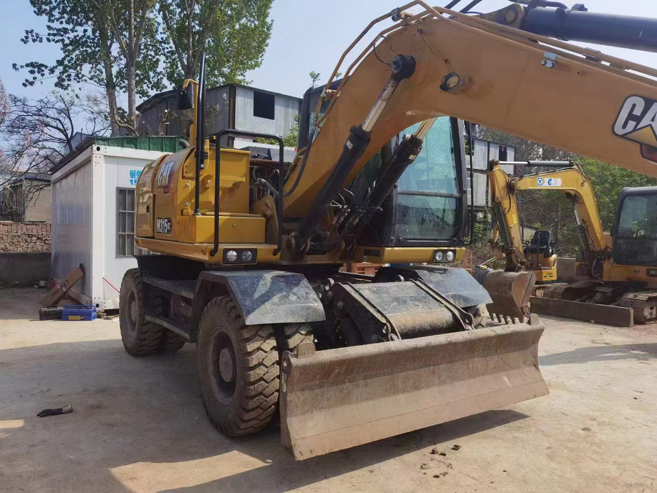 CATERPILLAR M315GC - Pelle sur pneus: photos 3 CATERPILLAR M315GC - Pelle sur pneus: photos 3