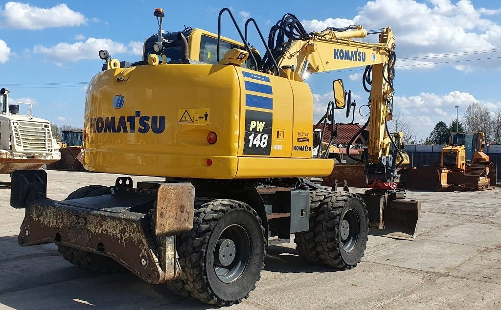 Komatsu PW148-10 - Pelle sur pneus: photos 5 Komatsu PW148-10 - Pelle sur pneus: photos 5
