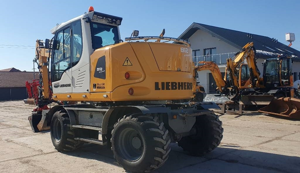 Liebherr A 912 compact - Pelle sur pneus: photos 2 Liebherr A 912 compact - Pelle sur pneus: photos 2