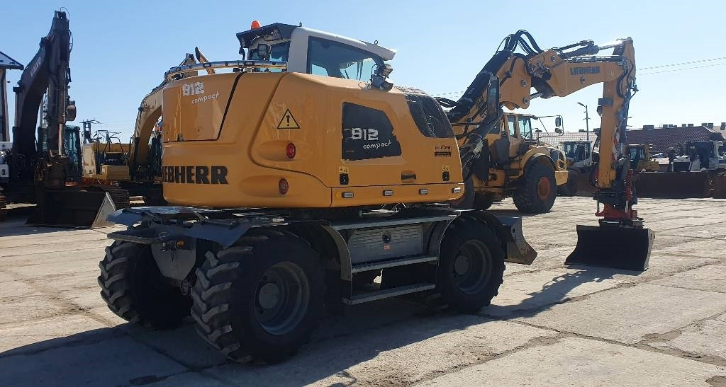 Liebherr A 912 compact - Pelle sur pneus: photos 4 Liebherr A 912 compact - Pelle sur pneus: photos 4