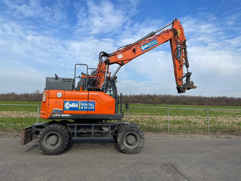 Doosan DX165W-5 - Pelle sur pneus: photos 4 Doosan DX165W-5 - Pelle sur pneus: photos 4