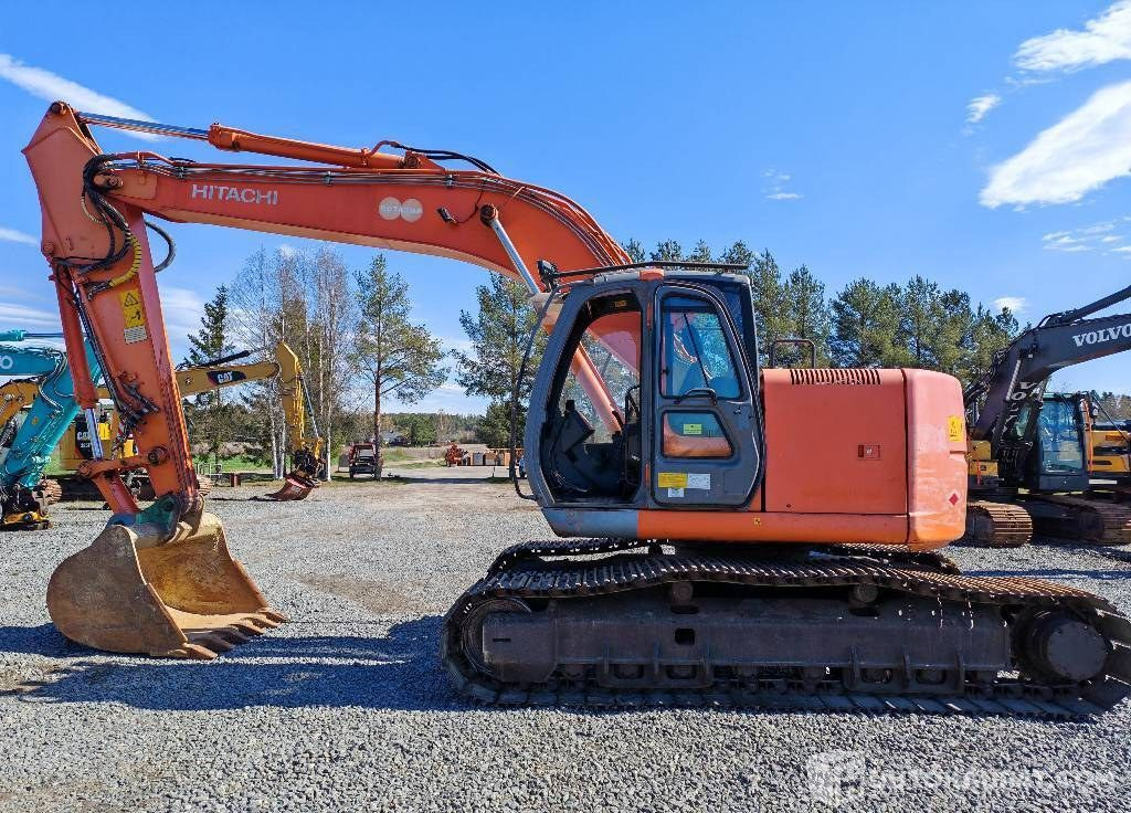 Hitachi ZX 225 US, 2003, 16 156 h Kaivinkone, Kurikka - Pelle sur chenille: photos 1 Hitachi ZX 225 US, 2003, 16 156 h Kaivinkone, Kurikka - Pelle sur chenille: photos 1