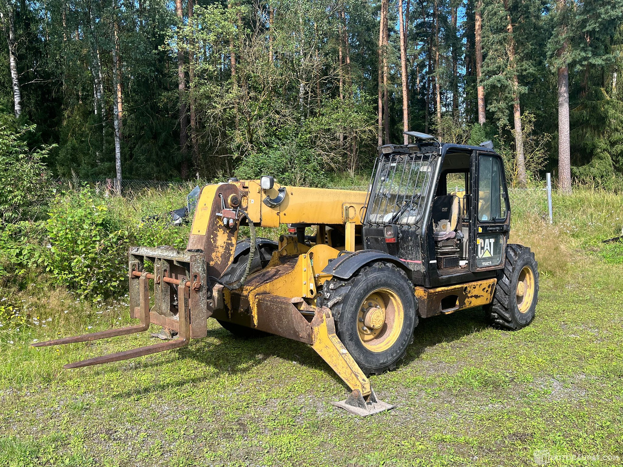 Caterpillar TH63, kurottaja piikeillä ja kauhalla, 2002, Loppi - Machine agricole: photos 1 Caterpillar TH63, kurottaja piikeillä ja kauhalla, 2002, Loppi - Machine agricole: photos 1